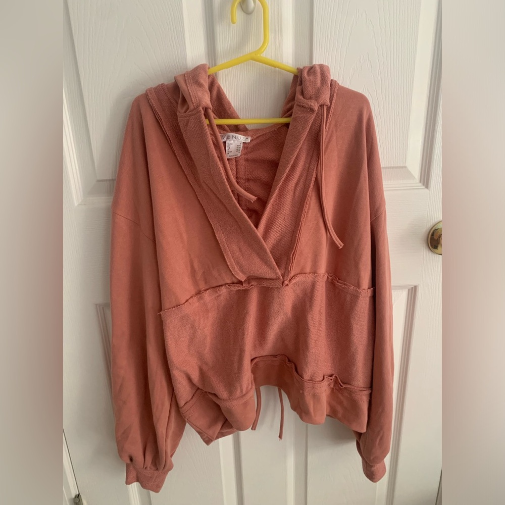 Size medium, pink venus sweatshirt.